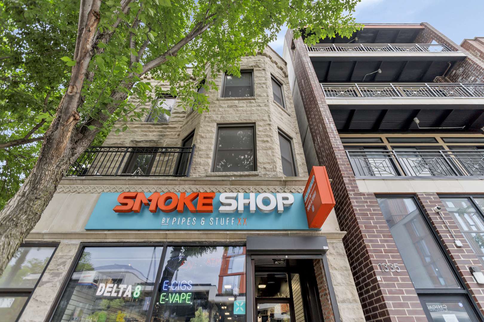 1333 West Taylor Street, Unit 2 Chicago, IL 60607 - Photo 2 of 22 a sign on the side of a building