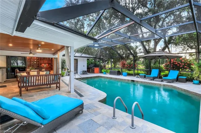 a view of swimming pool with a patio