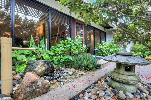 a view of a garden with patio