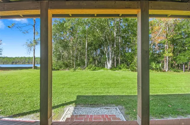a view of a house with a big yard