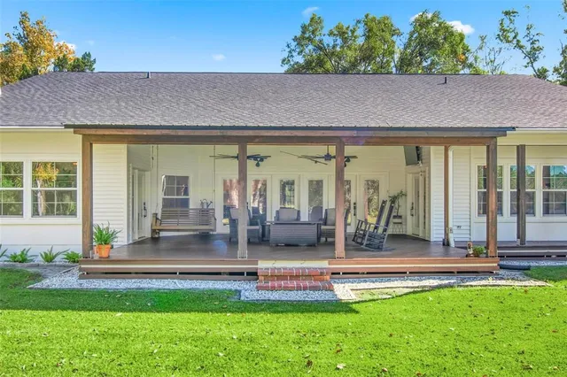 a view of backyard with a barn and a cactus plant