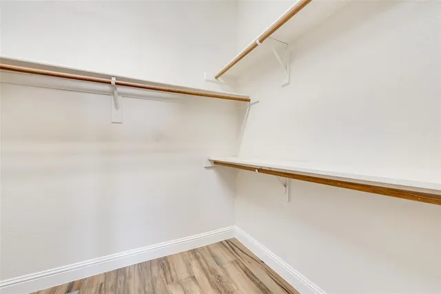 a view of a room with racks on the wall