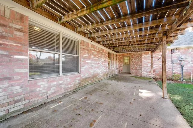 a view of porch with large windows