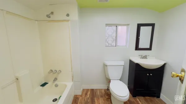 a utility room with sink dryer and washer