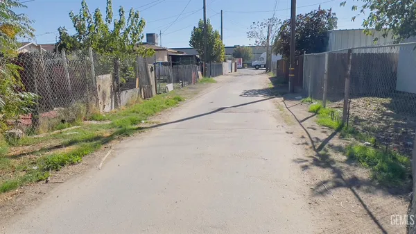 a view of a backyard with furniture