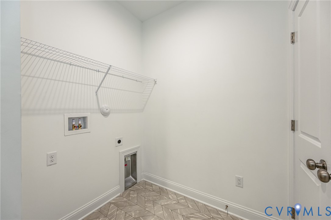 720 Chapman Street Ashland, VA 23005 - Photo 11 of 50 a view of storage and utility room with empty racks