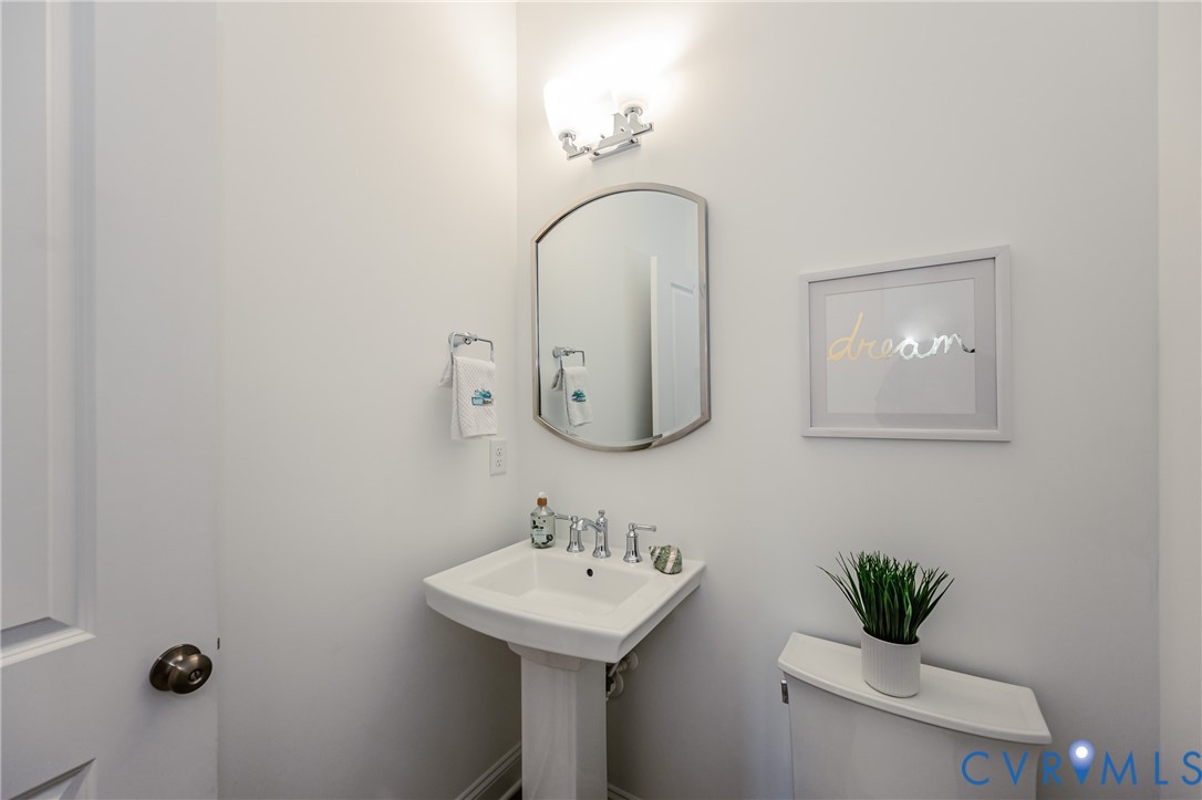 720 Chapman Street Ashland, VA 23005 - Photo 26 of 50 a bathroom with a sink and a mirror