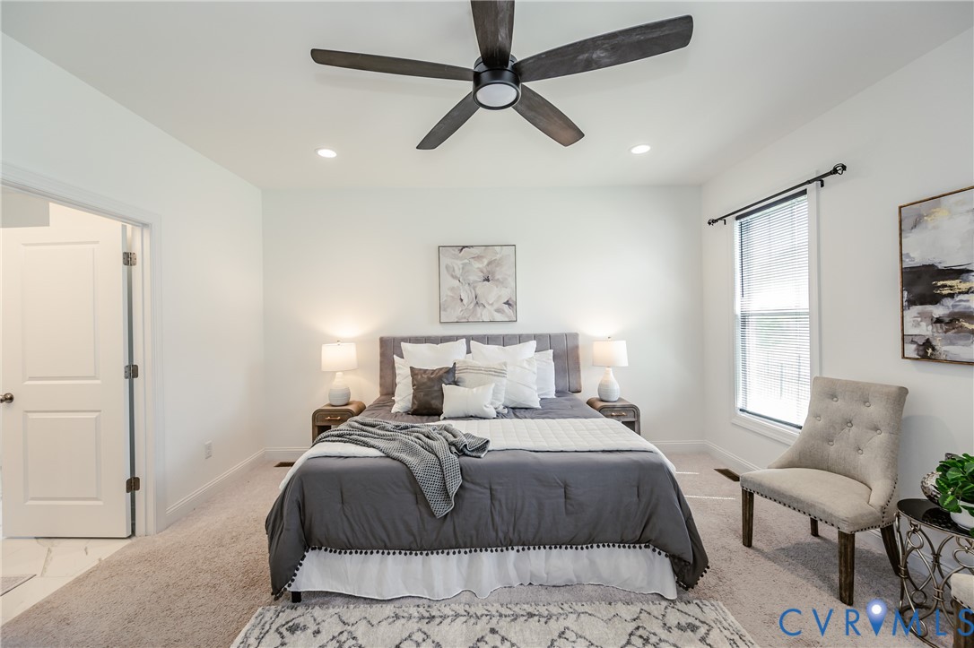 720 Chapman Street Ashland, VA 23005 - Photo 28 of 50 a bedroom with a bed chandelier and a window