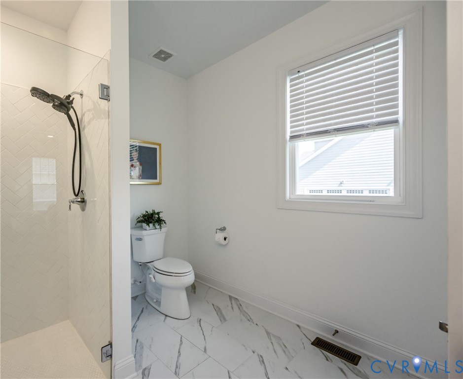 720 Chapman Street Ashland, VA 23005 - Photo 34 of 50 a bathroom with a toilet and a sink