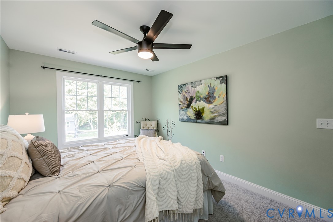 720 Chapman Street Ashland, VA 23005 - Photo 45 of 50 a bedroom with a large bed and a window