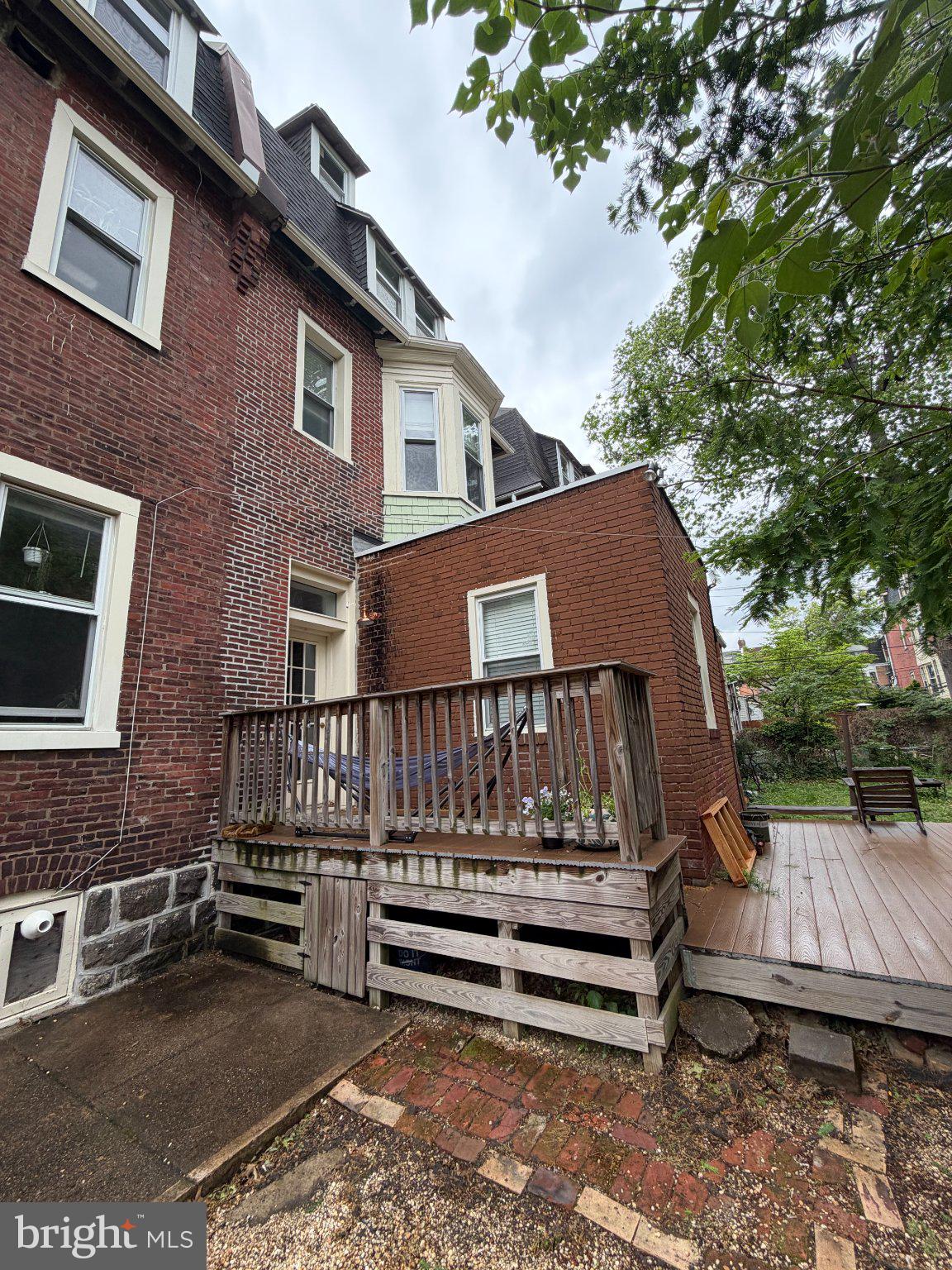 815 South 49th Street Philadelphia, PA 19143 - Photo 56 of 72 a view of a house with a yard and wooden floor