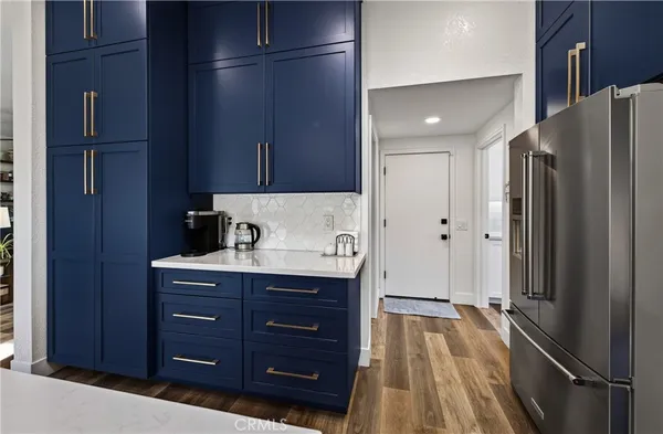 a view of a kitchen from the hallway