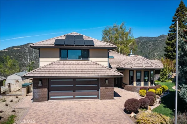a view of a house with a patio