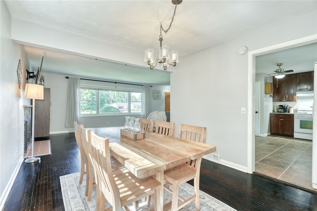 1038 Whalen Road Penfield, NY 14526 - Photo 11 of 46 Formal dining space with hardwood flooring