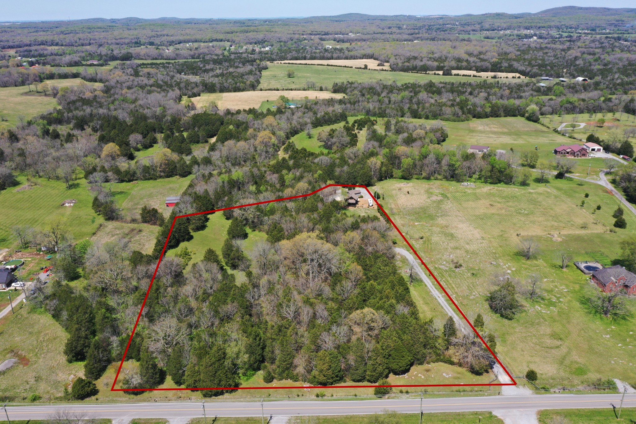 429 Vesta Road Lebanon, TN 37090 - Photo 43 of 45 an aerial view of a residential houses with outdoor space and trees