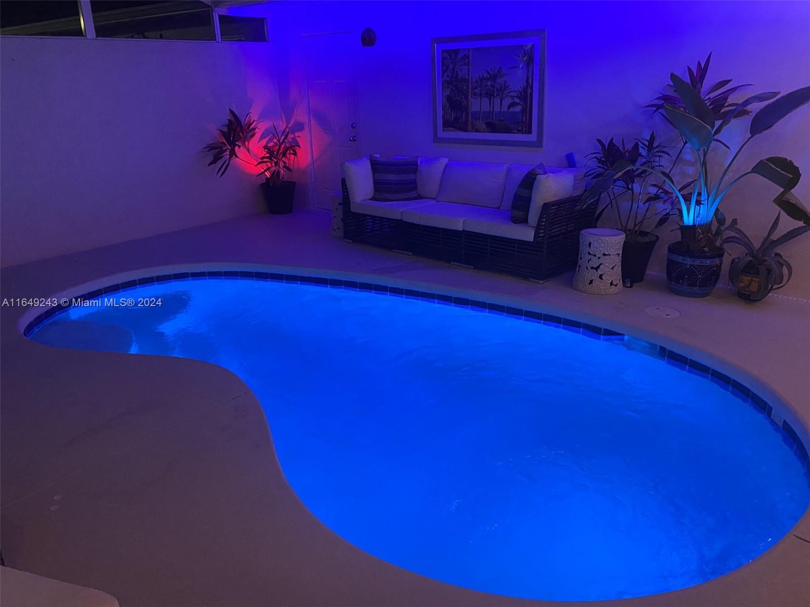 155 Soriano Drive, Unit 155 Jupiter, FL 33458 - Photo 18 of 29 a view of a room with a couch