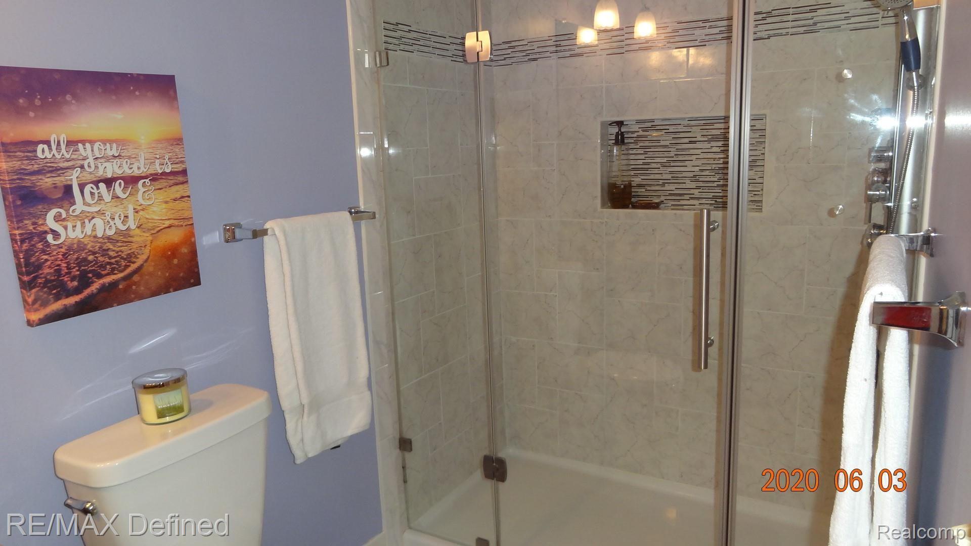1675 Huntington Park, Unit E Rochester, MI 48309 - Photo 23 of 33 Master bath with large walk in shower
