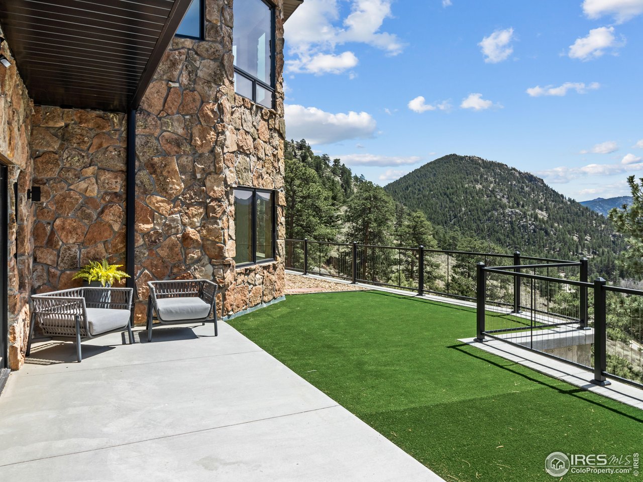 2701 Fall River Road Estes Park, CO 80517 - Photo 40 of 40 a view of a garden with patio