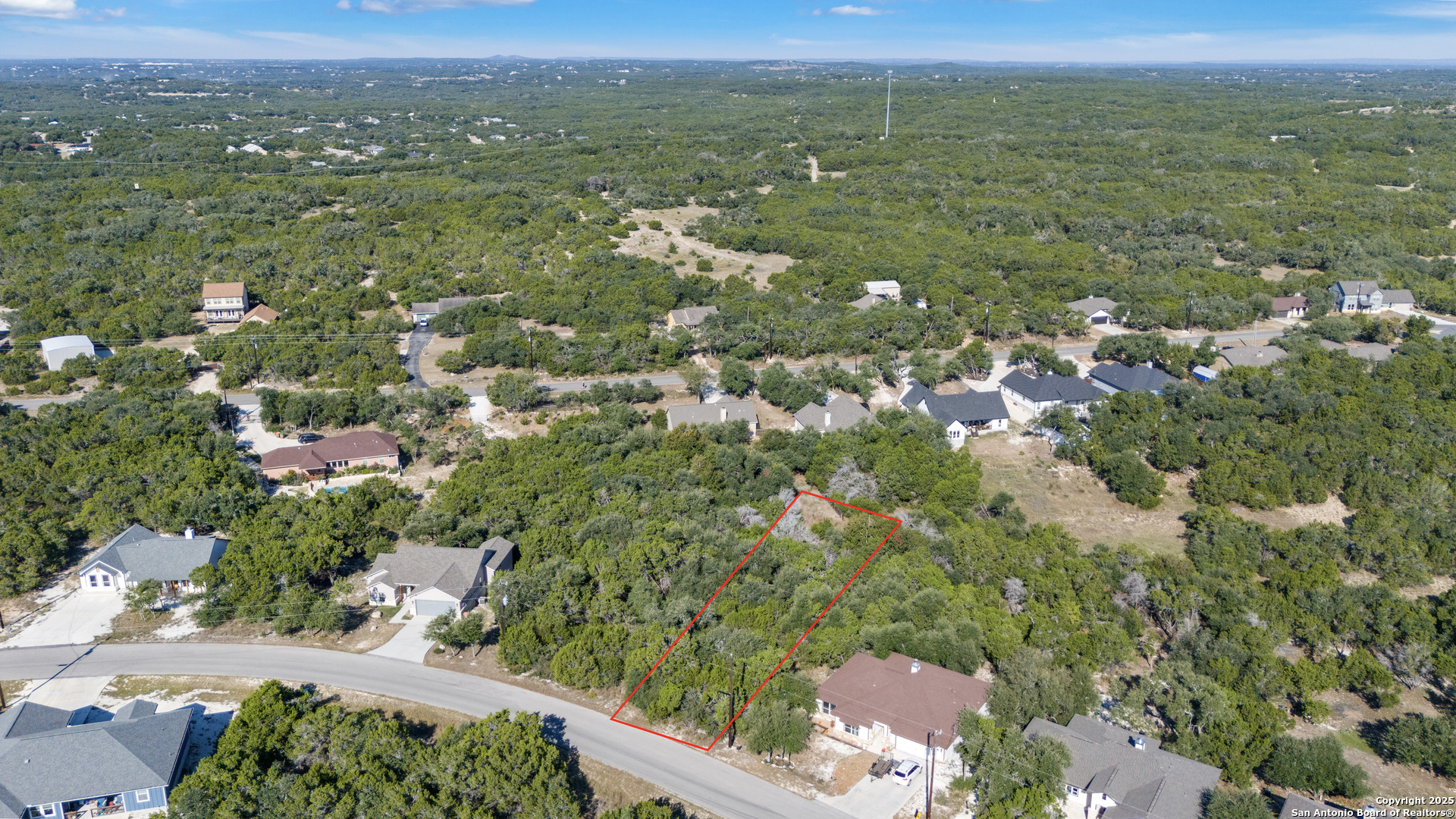 1483 Redwood Road Fischer, TX 78623 - Photo 2 of 13 a view of a city