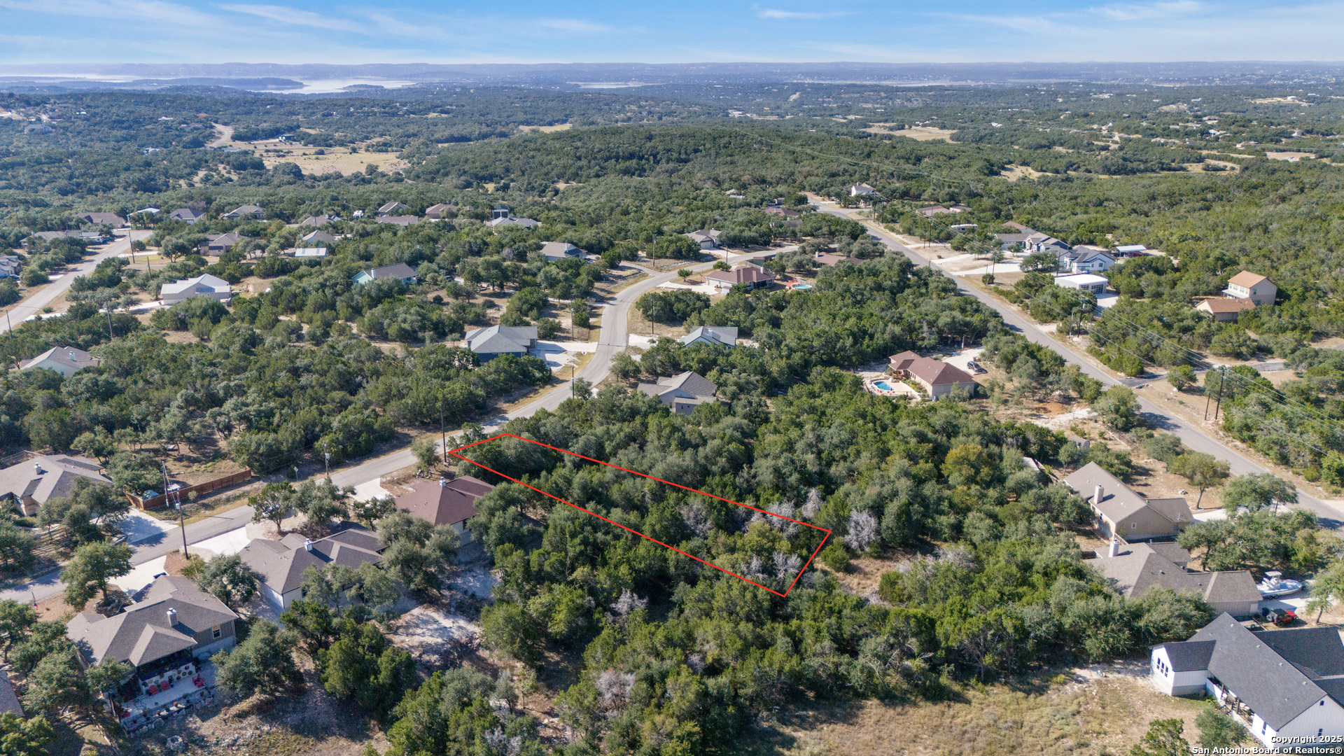 1483 Redwood Road Fischer, TX 78623 - Photo 4 of 13 a view of a city with mountain view
