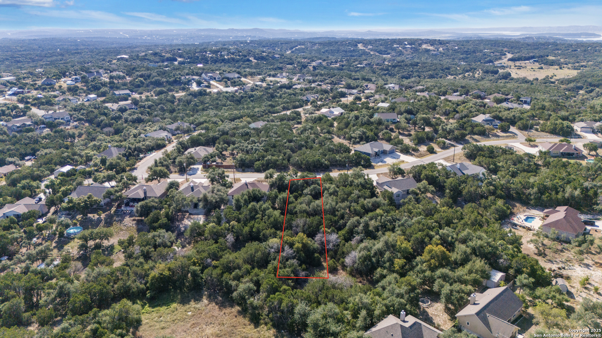 1483 Redwood Road Fischer, TX 78623 - Photo 5 of 13 an aerial view of a city