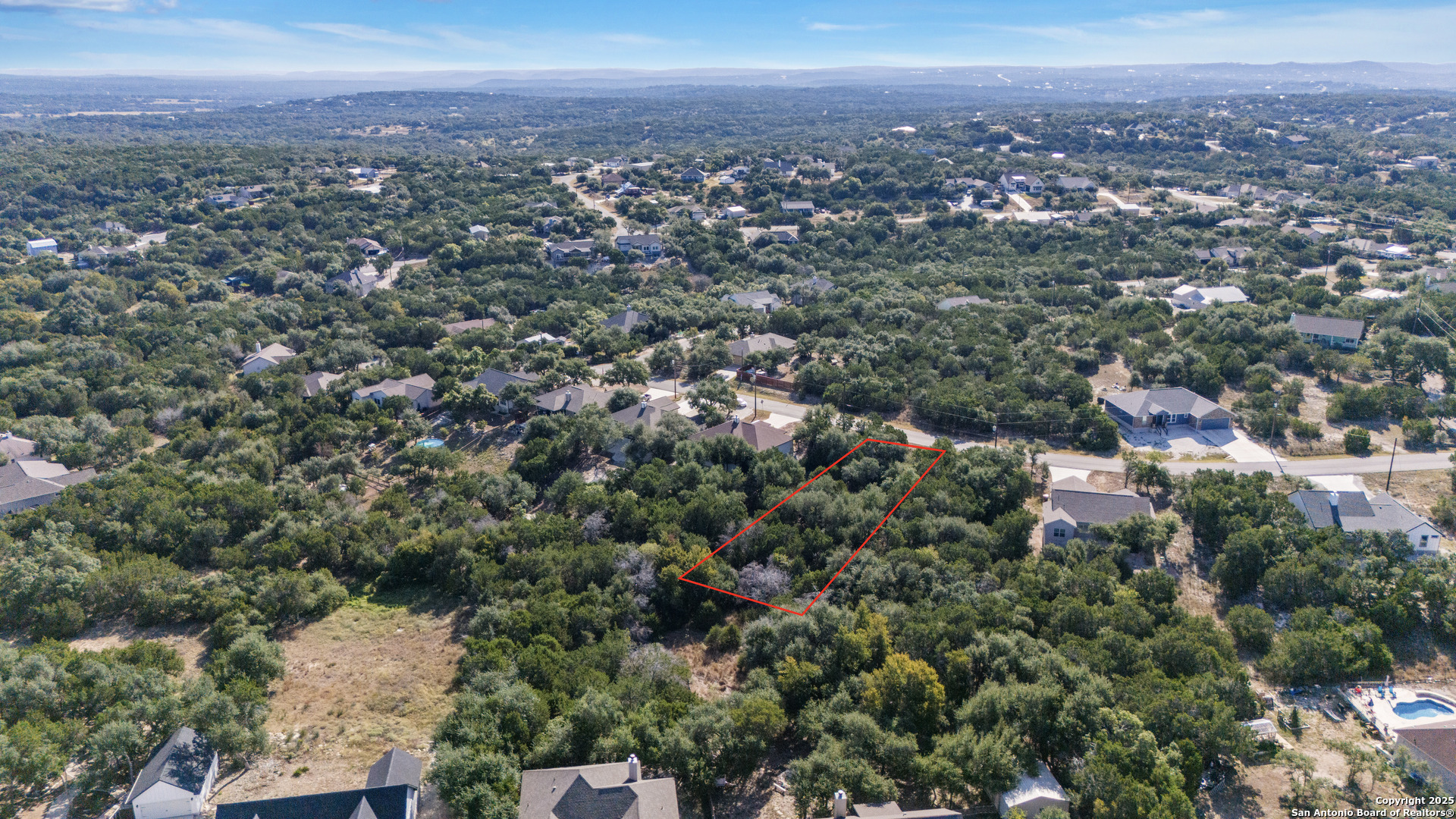 1483 Redwood Road Fischer, TX 78623 - Photo 6 of 13 an aerial view of multiple house