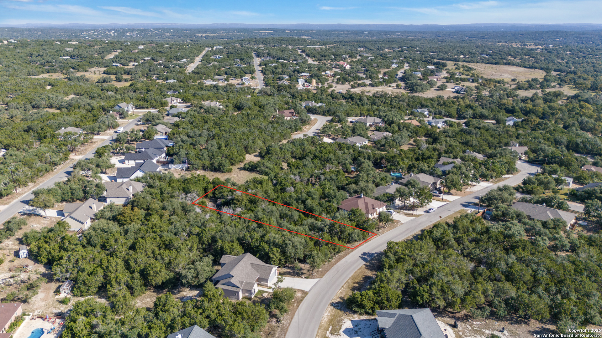 1483 Redwood Road Fischer, TX 78623 - Photo 8 of 13 an aerial view of a city