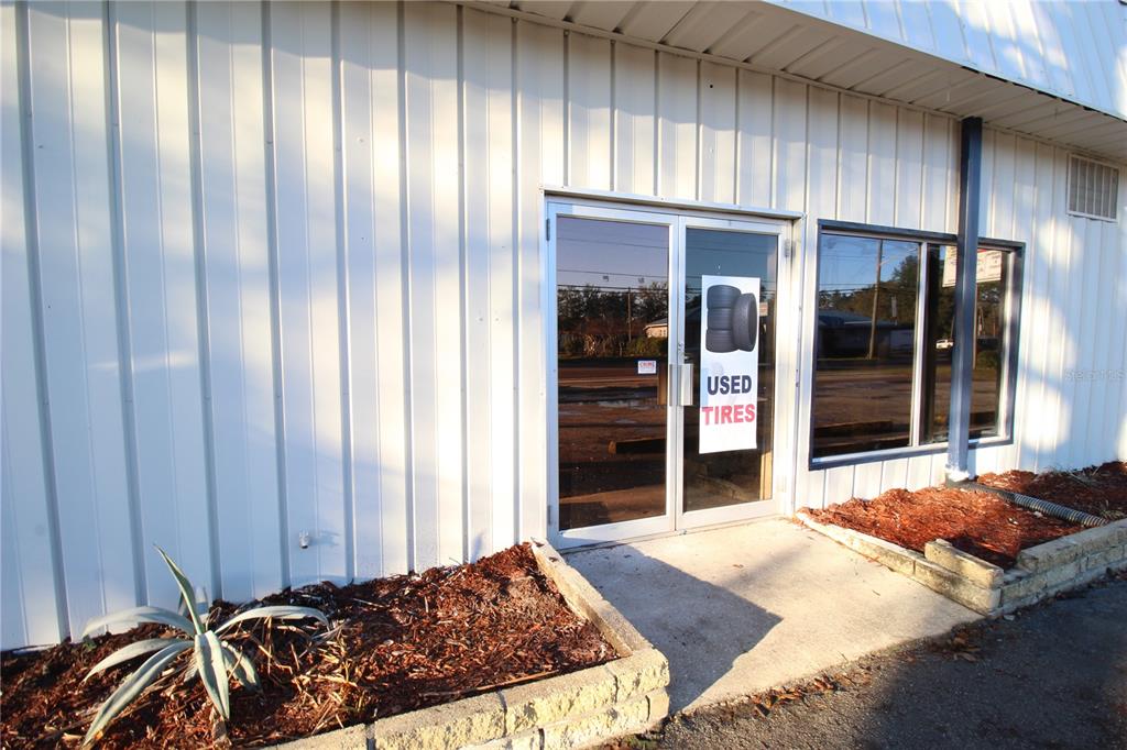 4502 Northwest 6th Street Gainesville, FL 32609 - Photo 3 of 4 a bedroom with a bed and a window