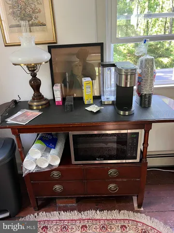 a living room with furniture and window