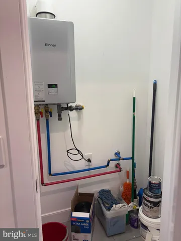 a room with furniture and white walls