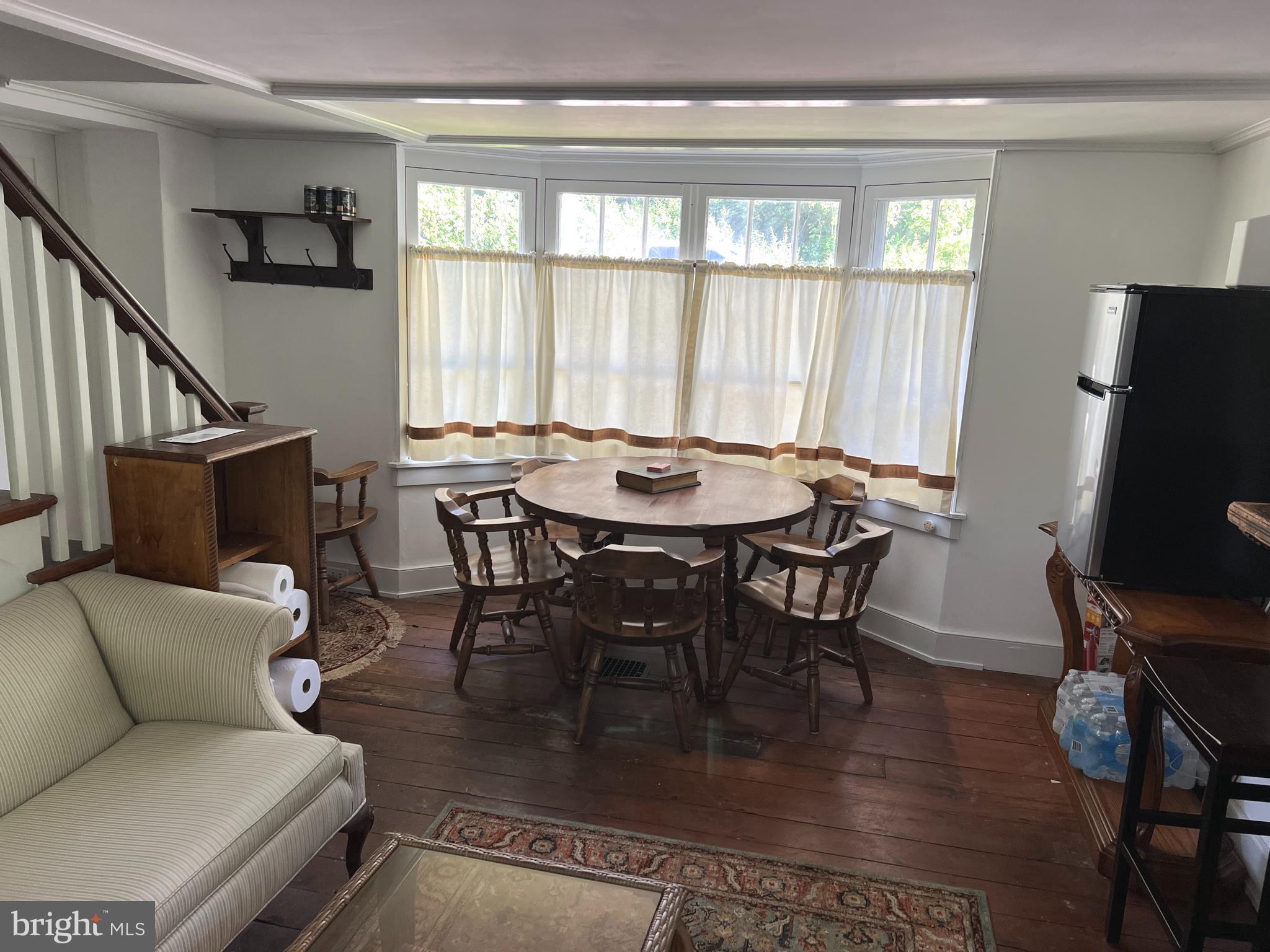 6230 Lower York Road New Hope, PA 18938 - Photo 5 of 20 a dining room with furniture and wooden floor