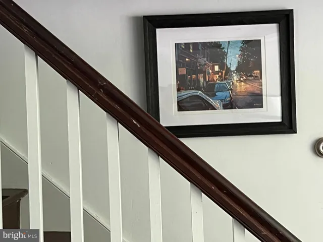 a wooden floor with a hallway