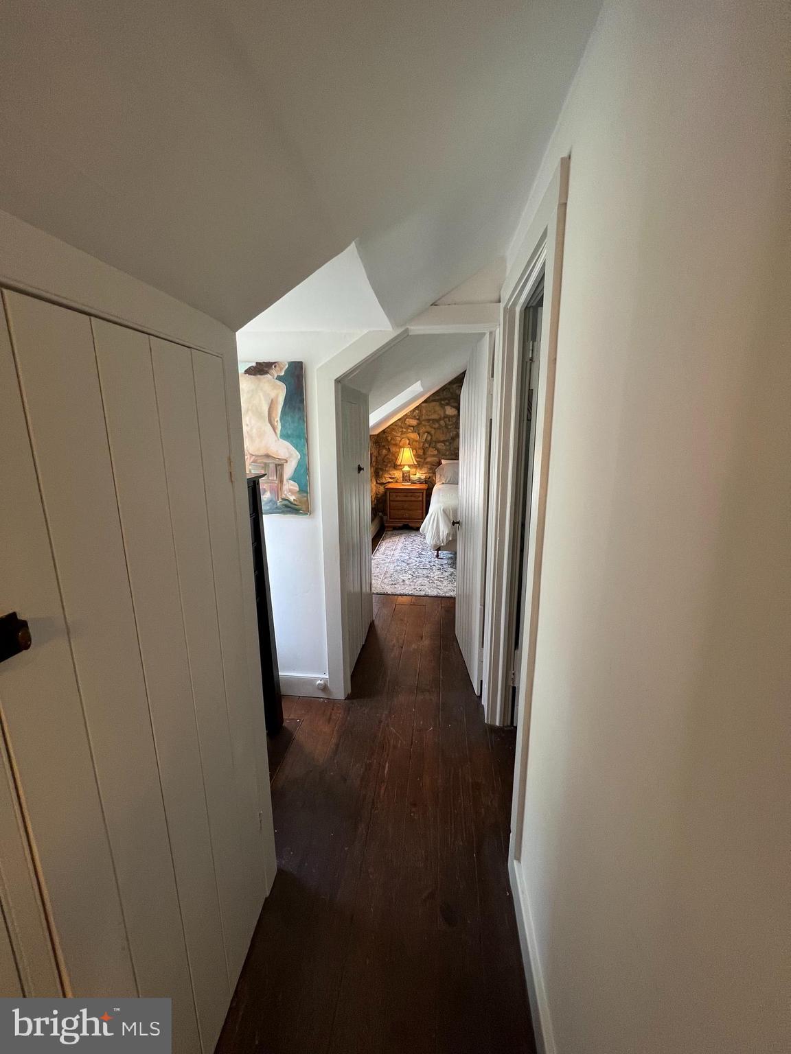 6230 Lower York Road New Hope, PA 18938 - Photo 9 of 20 a view of a hallway with wooden floor and staircase