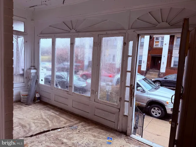 a room with window and furniture