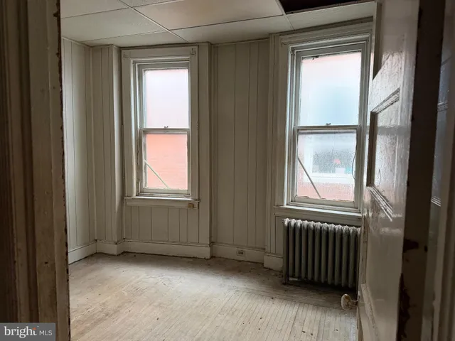 a view of a room that has a window in it