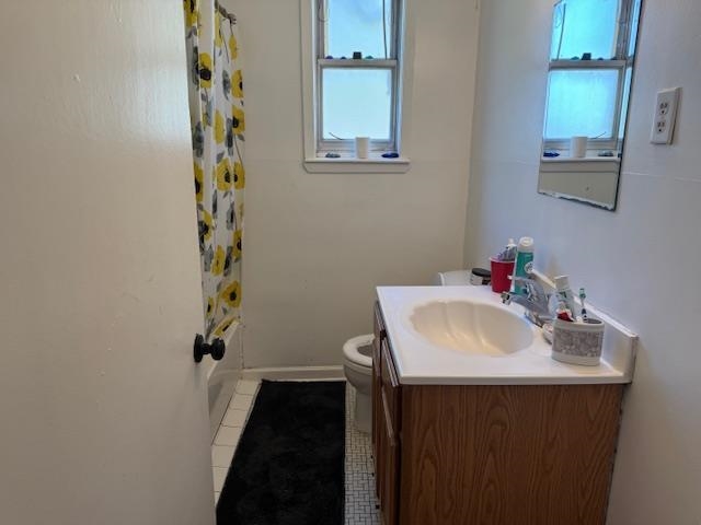 1345 Maria Street Memphis, TN 38122 - Photo 7 of 11 a bathroom with a sink and a mirror