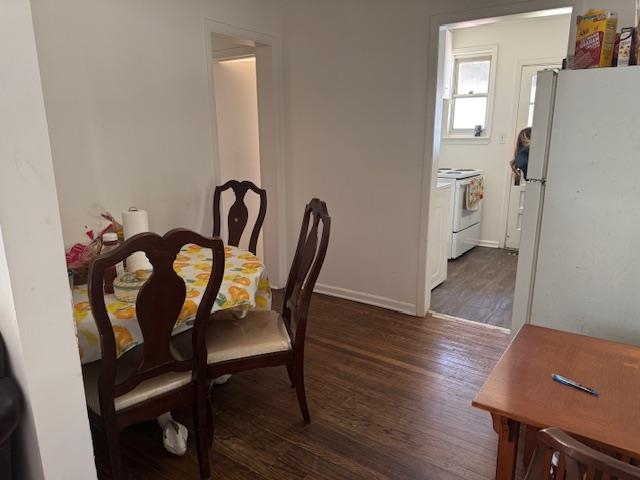 1345 Maria Street Memphis, TN 38122 - Photo 10 of 11 a view of a dining room with furniture and wooden floor