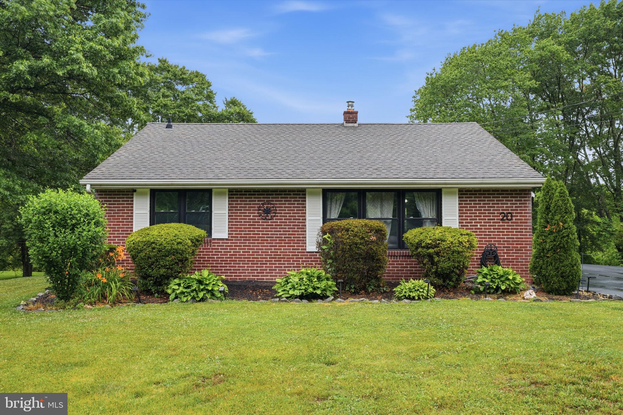 20 Poplar Road Ringoes, NJ 08551 - Photo 3 of 44 Charming brick home with lush greenery.