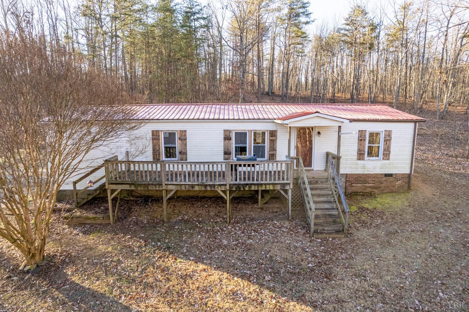 408 Jacobs Road Hurt, VA 24563 - Photo 1 of 49 a view of a house with a yard and sitting area