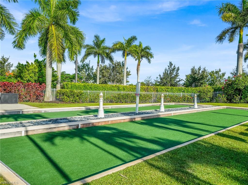 14695 Edgewater Circle Naples, FL 34114 - Photo 36 of 39 a view of a golf course with a garden
