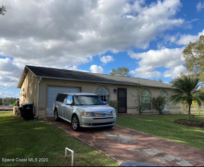 240 Wendover Road Southwest Palm Bay, FL 32908 - Photo 1 of 10 Front of home