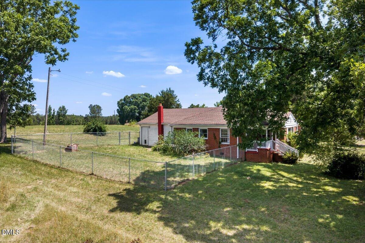 109 Little Ponderosa Road Macon, NC 27551 - Photo 25 of 32 a view of a backyard