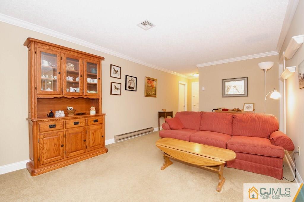 781 B Risley Road Monroe Township, NJ 08831 - Photo 3 of 20 a living room with furniture and a window