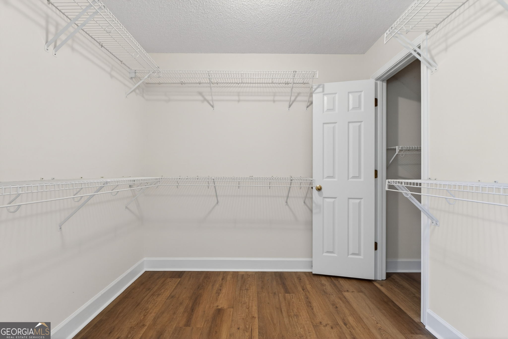 955 Mocassin Gap Road Locust Grove, GA 30248 - Photo 24 of 59 a view of small space with racks on the wall