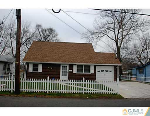 502 Harding Road Old Bridge, NJ 08879 - Photo 1 of 11 a view of a house with a wooden fence