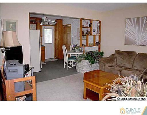 502 Harding Road Old Bridge, NJ 08879 - Photo 3 of 11 a living room with furniture and wooden floor