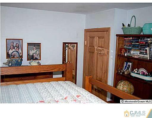 502 Harding Road Old Bridge, NJ 08879 - Photo 7 of 11 a living room with furniture and a wooden floor