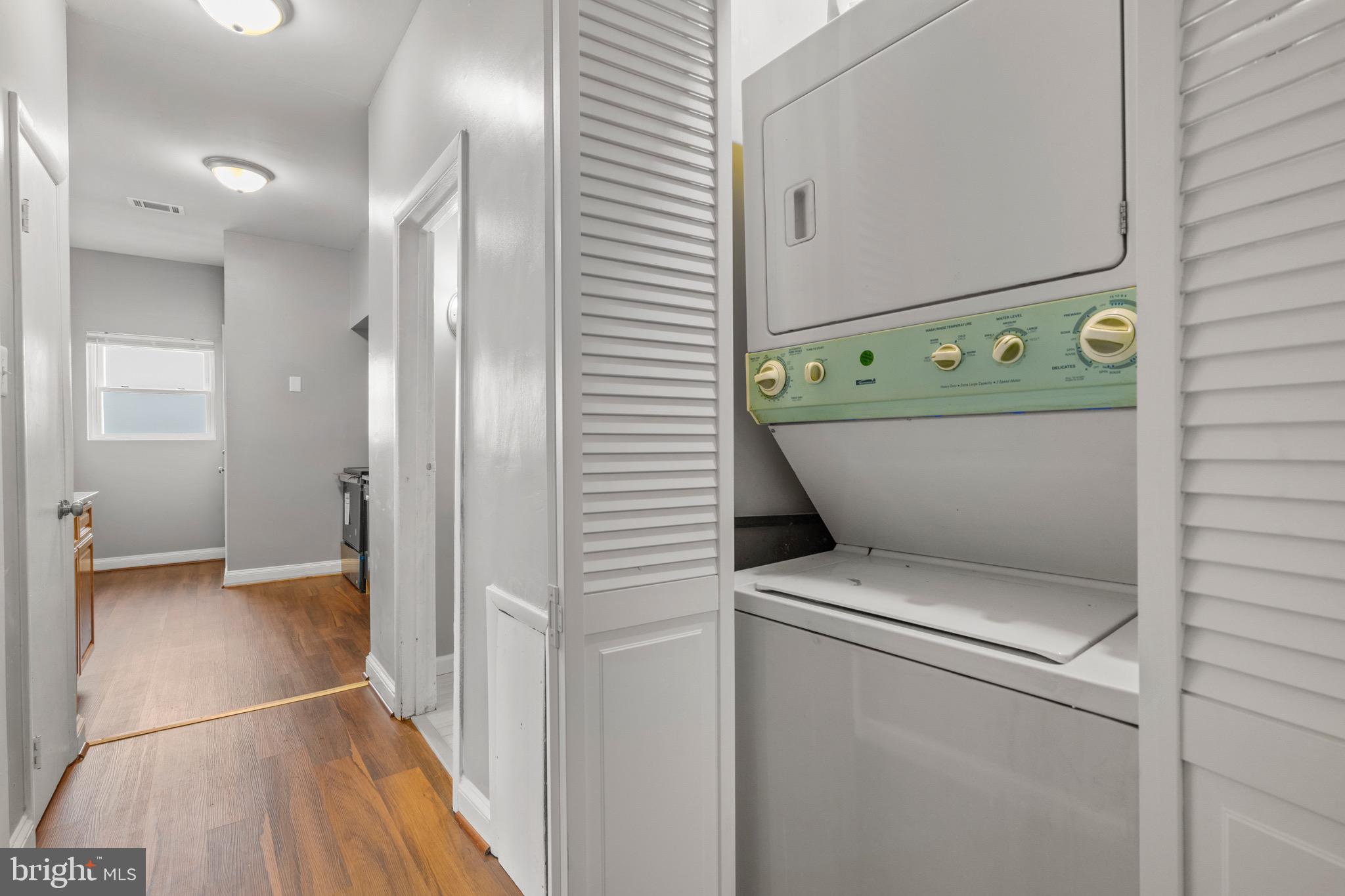 2834 R Street Southeast, Unit 5 Washington, DC 20020 - Photo 14 of 30 a view of washer and dryer with bathroom in the background