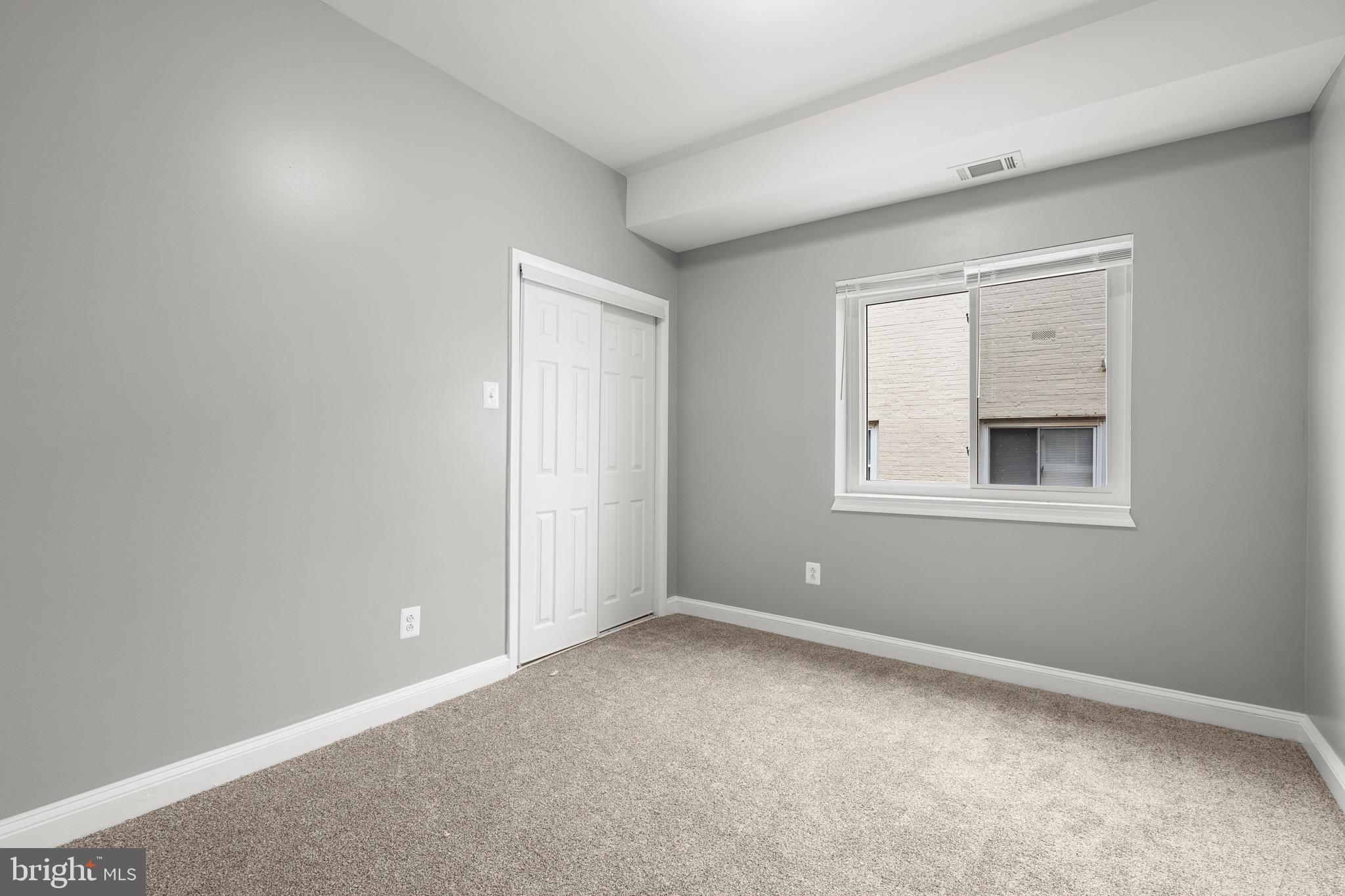 2834 R Street Southeast, Unit 5 Washington, DC 20020 - Photo 15 of 30 a view of an empty room with a window