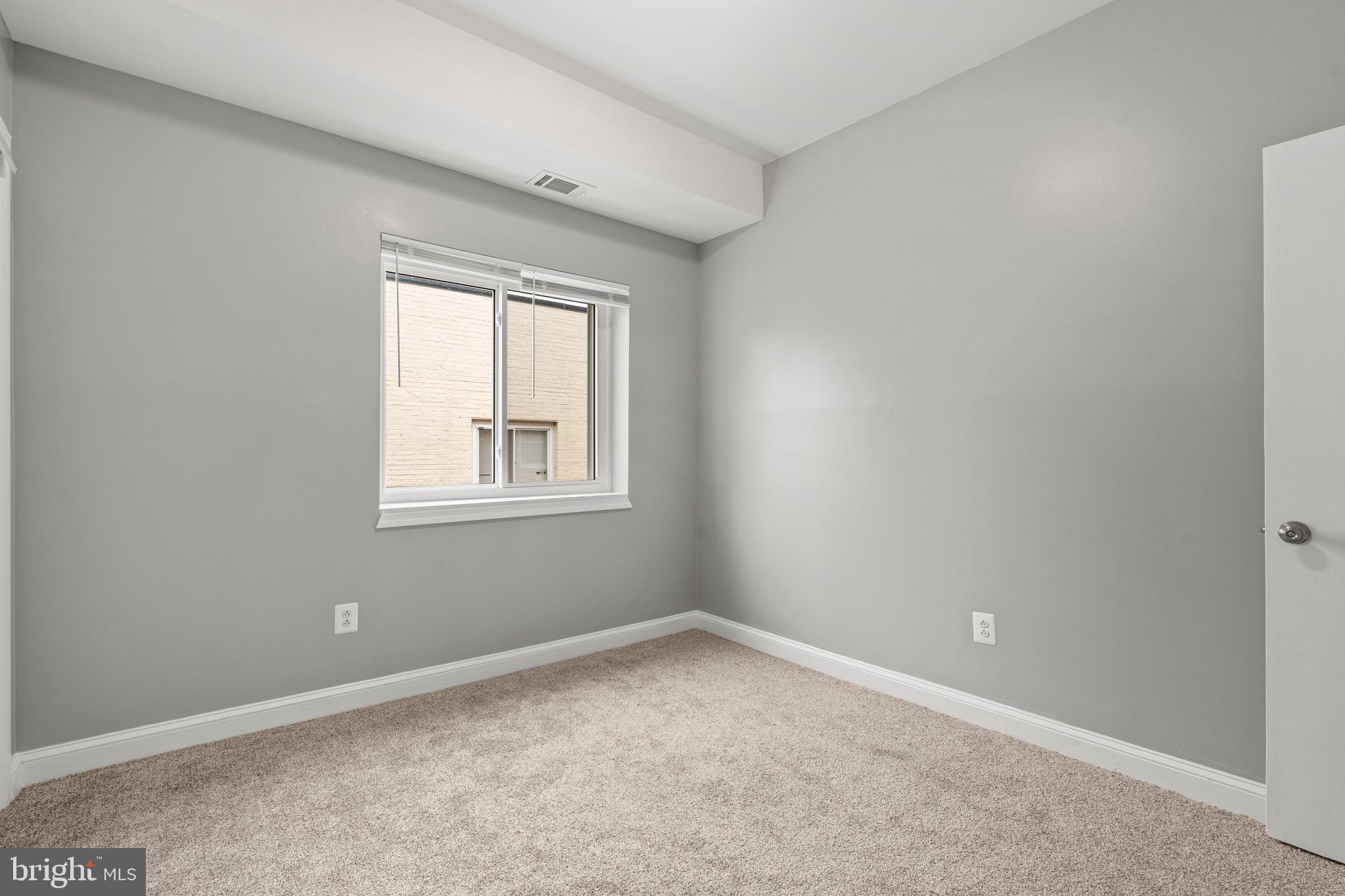 2834 R Street Southeast, Unit 5 Washington, DC 20020 - Photo 16 of 30 an empty room with a window